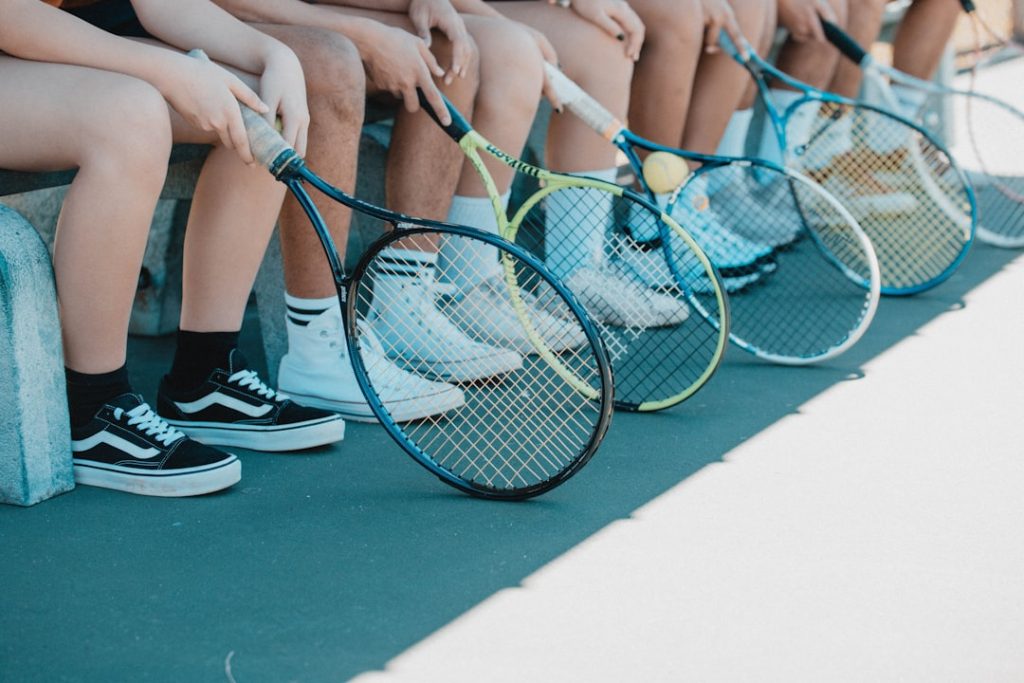 Sitting on the bench before tennis practice, want more photos like this contact me